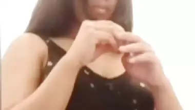 Chubby shy Indian girl showing round boobs to lover