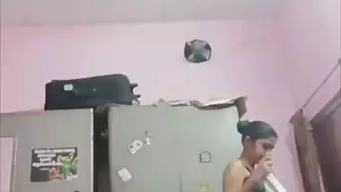 Sister changing dress caught on camera by brother