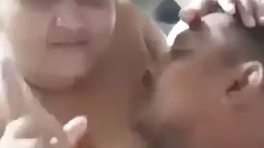 Chubby wife soft boobs pressed against husband in foreplay