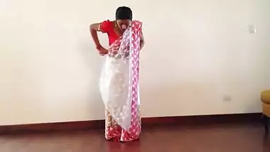 Indian Girl Giving Sari Lesson - Movies.