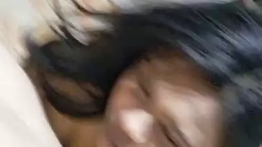 GF with smiling face gives blowjob to boyfriend